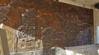 The mosaic is made of oil-infused pebblestones