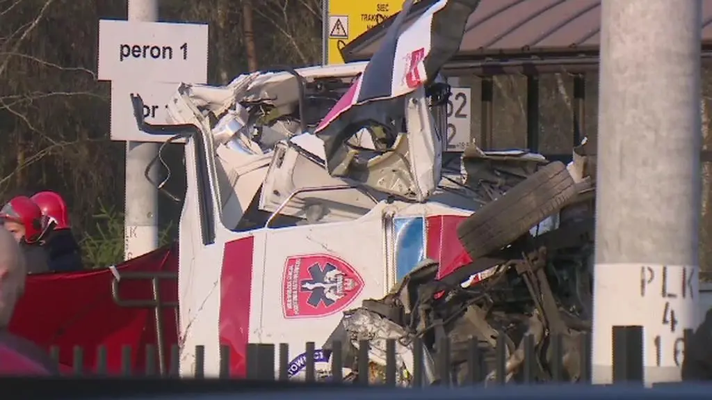 Ambulance hit by a train in western Poland. Two people dead