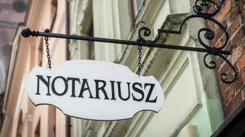 Notariusz - tablica na Rynku Staromiejskim w Toruniu