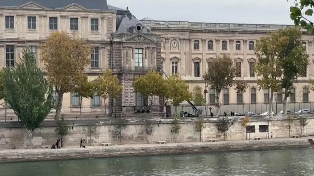 Crane and broken window at Louvre