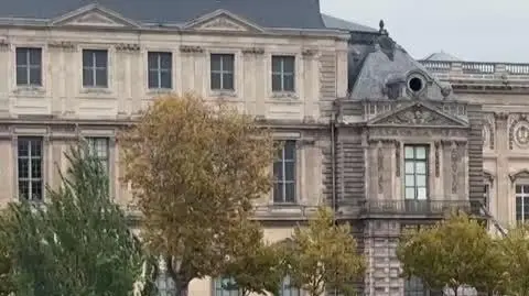Crane and broken window at Louvre