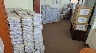 Oskarżeni odpowiedzą za 9786 przestępstw i "wypranie" prawie 400 mln zł