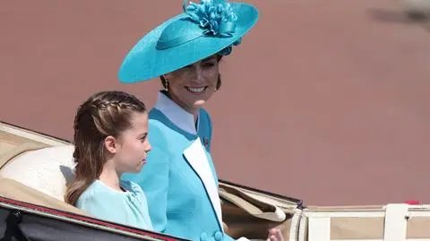 Britain’s Princess Charlotte and her mother Catherine, Princess of Wales ride in a carriage during the Trooping the Colour 