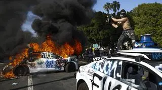 Burning autonomous taxis in Los Angeles