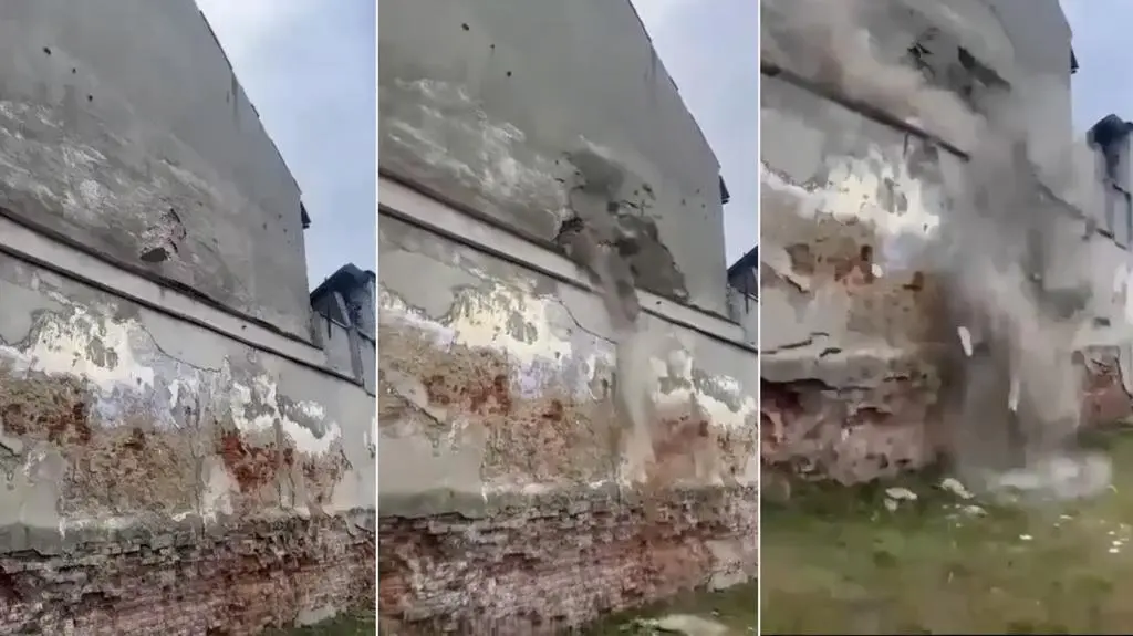 Moment zawalenia się ściany kamienicy 