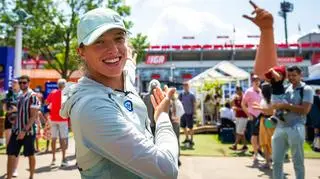 Iga Świątek in front of IGA Stadium in Montreal - the main tennis court at the Canadian Open