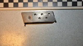 "Zabezpieczony pistolet to Browning kaliber 6"