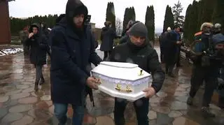 The unborn child was buried in a tiny white coffin