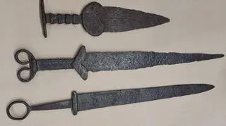 There were three ancient swords in the parcel