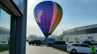 Balon lądował na parkingu
