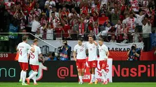 Jakub Kiwior (number 14) celebrates his goal with teammates