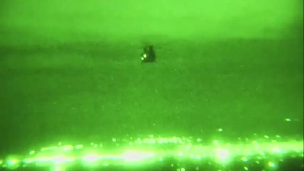 Śmigłowce Chinook podczas lotu nocą