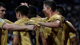 Lewandowski celebrates with Barca teammates