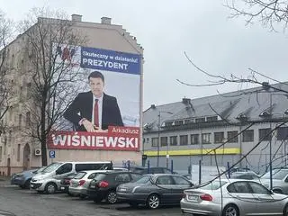 Plakat wyborczy prezydenta Opola z hasłem: "Skuteczny w działaniu!"