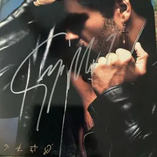 Okładka najbardziej utytułowanego albumu George'a Michaela "Faith"