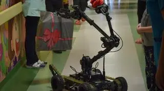 A bomb disposal robot distributed helped to distribute the gifts to the kids