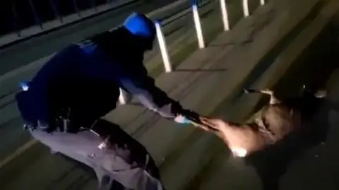 Police patrol save a deer that got stuck in bike lane barrier