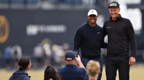 Adrian Meronk i Tiger Woods
