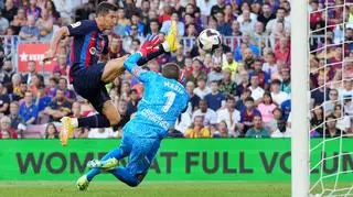 Robert Lewandowski scored his first goal of game by finishing off Raphinha's excellent cross