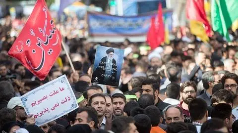 Iranians protesting against sanctions imposed by the West on their country