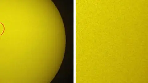 Wahadłowiec Atlantis na tle Słońca