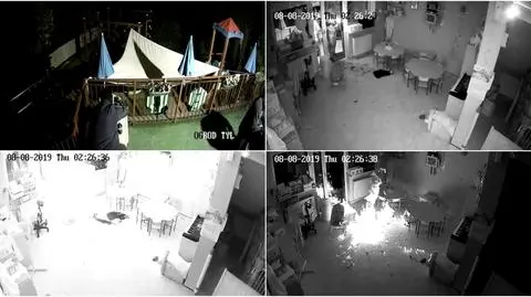 Kamery nagrały, jak mężczyźni wrzucają butelki z benzyną do budynku