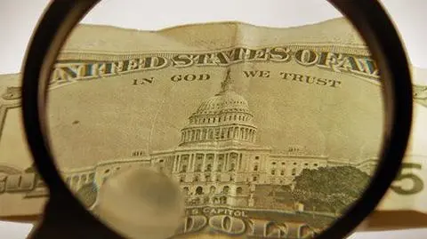 "In God We Trust". Batalia o motto