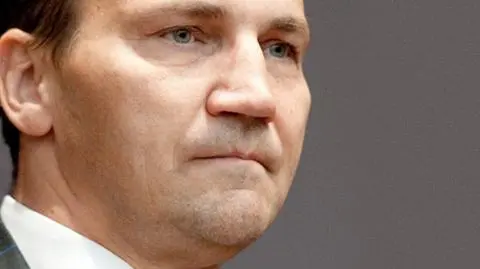 "Globalny myśliciel" Sikorski 
