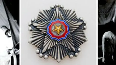 Dr Józef Grenda opatruje rannego żołnierza