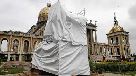 Monument to former custodian of Licheń Sanctuary Father Eugeniusz M. covered with tarp after he was accused of paedohilia
