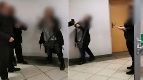 The priest his the woman in the face in a court corridor