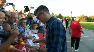 Robert Lewandowski giving autographs to the Polish fans during World Cup preparations