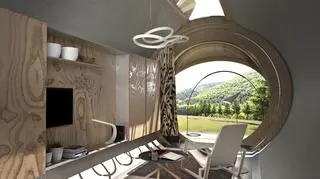 W środku jest salon, sypialnia, kuchnia i łazienka
