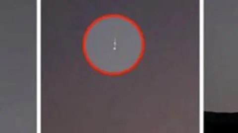 Spadająca ognista kula nad miastem Nelson