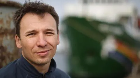 Tomasz Dziemianczuk - asktywista Greenpeace pochodzący z Gdańska