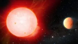 Gazowy olbrzym TOI-3757 b (z prawej) w towarzystwie czerwonego karła - wizja artysty