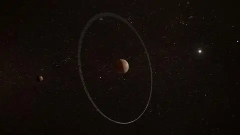 Artist_impression_of_Quaoar_and_its_ring