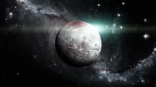 Charon - wizja artystyczna wykonana w oparciu o zdjęcia z misji New Horizons