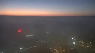 Mglisty wschód słońca nad Warszawą