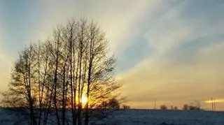 Halo wokół zachodzącego Słońca
