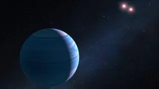 Planeta o masie Saturna jest na orbicie pary gwiazd
