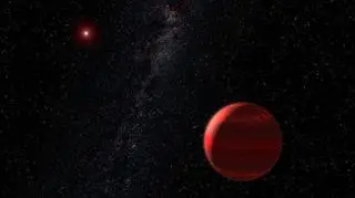 Czerwony karzeł i krążąca wokół niego planeta (wizja artysty)