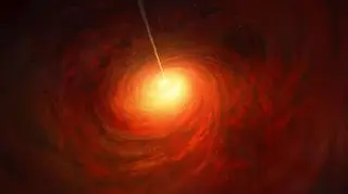 Artystyczna wizja czarnej dziury w sercu galaktyki M87 (ESO/M. Kornmesser)