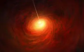 Artystyczna wizja czarnej dziury w sercu galaktyki M87 (ESO/M. Kornmesser)