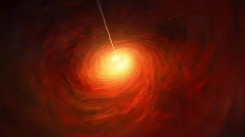 Artystyczna wizja czarnej dziury w sercu galaktyki M87 (ESO/M. Kornmesser)
