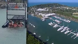 Mężczyźni weszli do pułapki na krokodyle umieszczonej w marinie w Port Douglas (Australia)