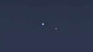 Ziemia i Księżyc sfotografowane 19.07.2013 r. przez sondę Cassini zza Saturna (NASA/JPL-Caltech/Space Science Institute)