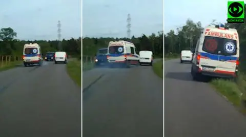 Karetka wyprzedza na "czołówkę", siwy dym na drodze