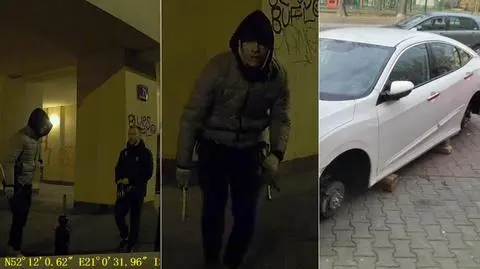 Auta bez kół w kilku dzielnicach. Na nagraniu mężczyźni z narzędziami