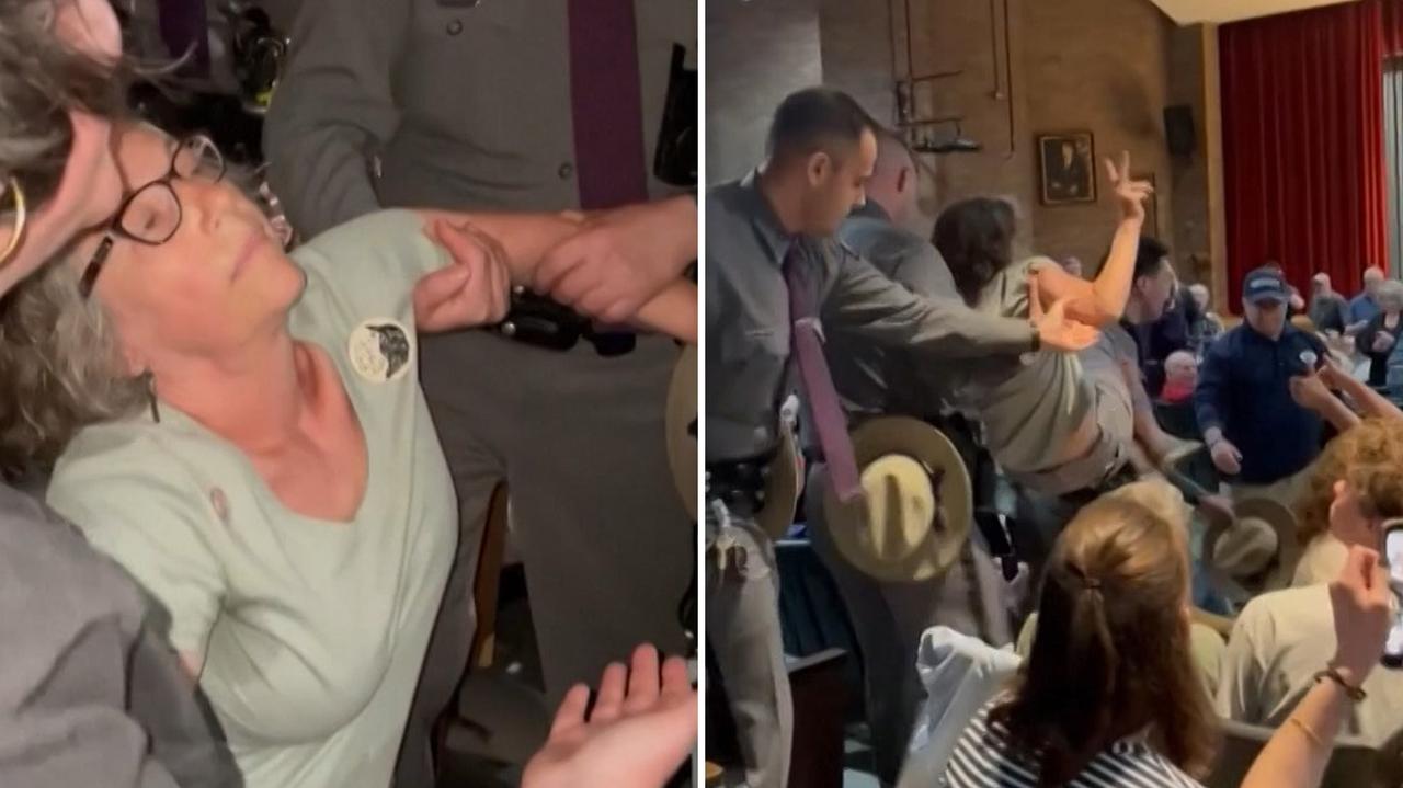 &#39;Let Her Stay&#39;: Activist Carried Out of gathering  with Republican Congressman